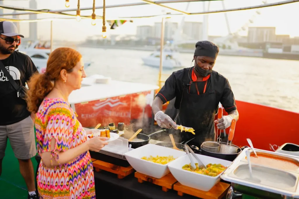 Chef making pasta on a dhow cruise