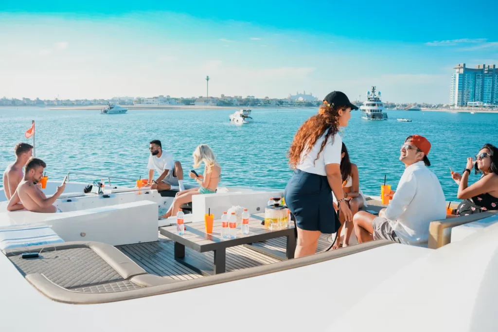 crew catering to people on the party yacht
