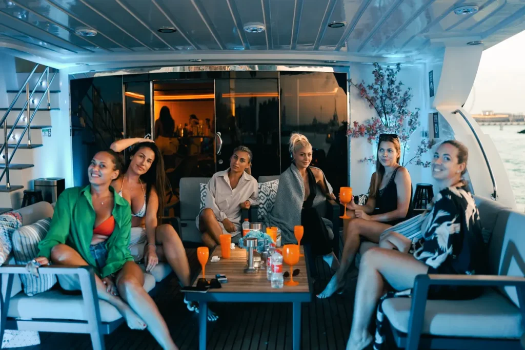 set of friends on a yacht party